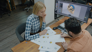 Blonde woman working at computer